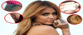 Miley Cyrus nuovo tatuaggio 'Love Never Dies', dedicato al suo fidanzato Liam Hemsworth Miley Cyrus nuovo tatuaggio 'Love Never Dies', dedicato al suo fidanzato Liam Hemsworth